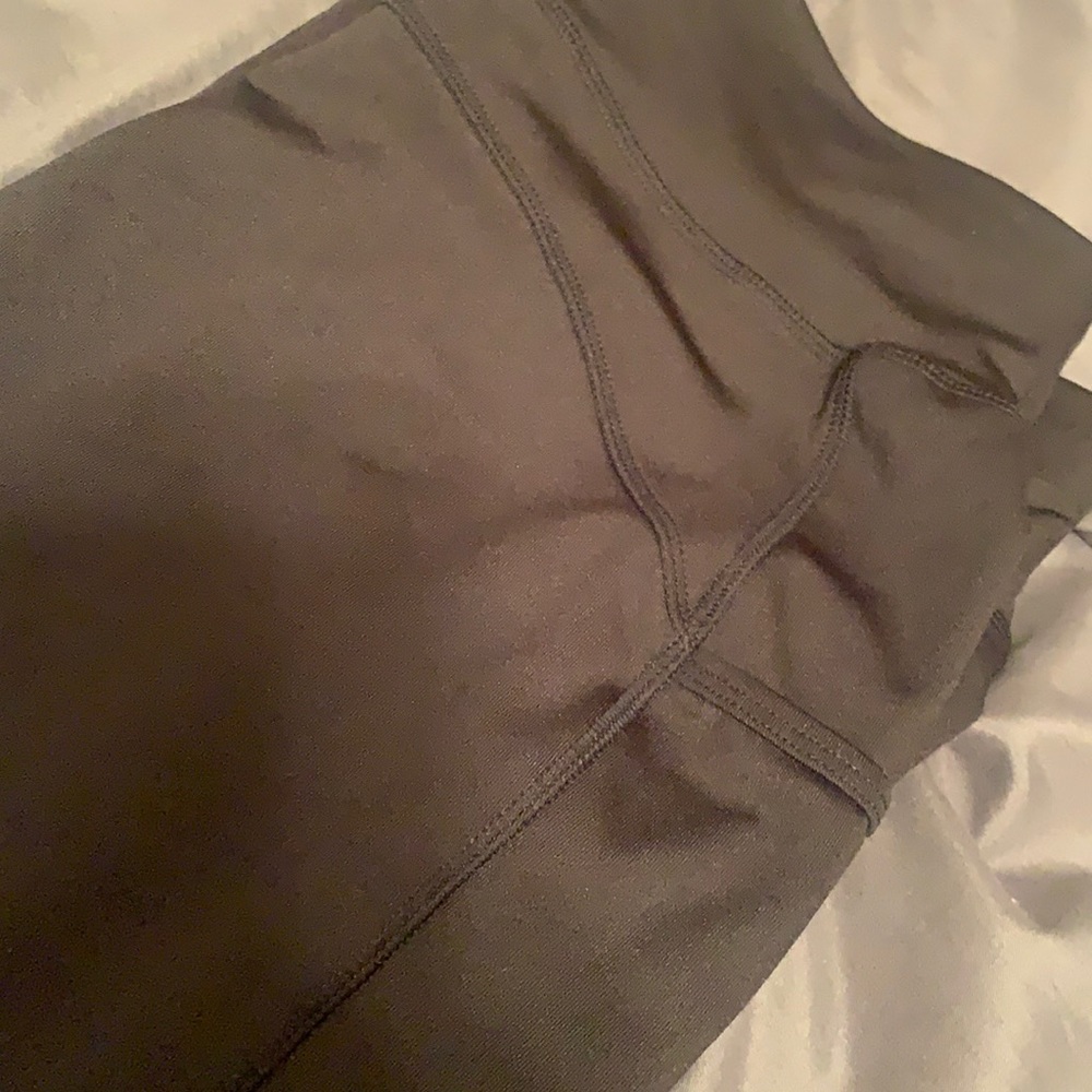 Pop fit leggings! Black! Pockets! Cute black cross on the bottom! Never worn!